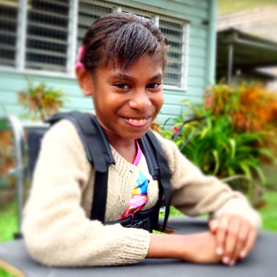 A girl from PNG in her new wheelchair