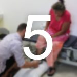 A woman gets her foot examined by a health professional. The number 5 sits over the image.